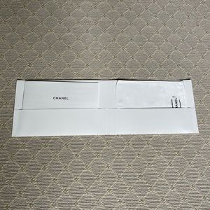 Authentic CHANEL Dust Mitt in folder with Chanel booklet - New in Plastic